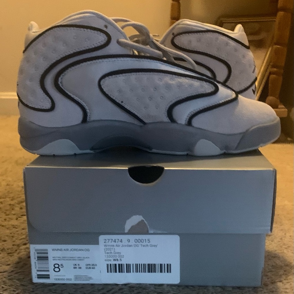 Brand new, never worn women’s Air Jordan OG Tech Grey